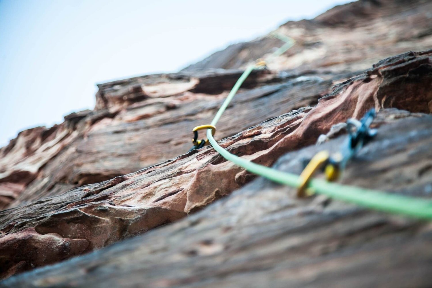 Rock climbing ropes against a rockface